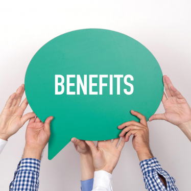 Group of people holding the BENEFITS written speech bubble